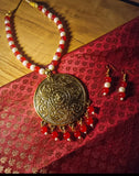 Red and White bead necklace with Gold Oxidised Pendant