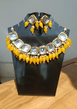 Elegant Kundan set with Yellow beads