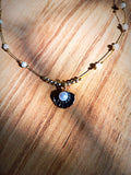 Invisible pendant with black shell charm